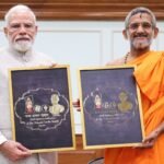 ಪೇಜಾವರ ಶ್ರೀ ಭೇಟಿಯಾದ ಪ್ರಧಾನಿ ಮೋದಿ; ಶತಮಾನೋತ್ಸವ ಲಾಂಛನ ಅನಾವರಣ